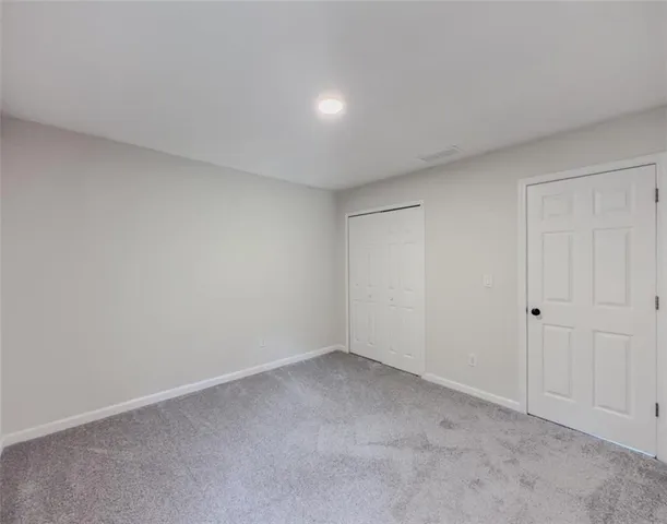 front view of a house with a small yard