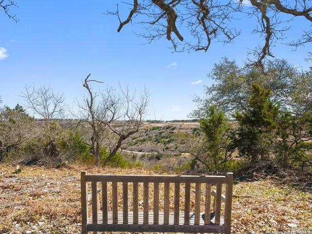 a view of a wooden fence