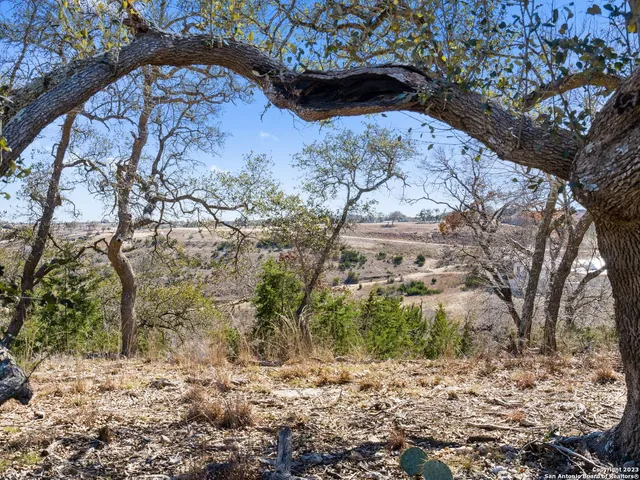 a view of a yard covered with snow