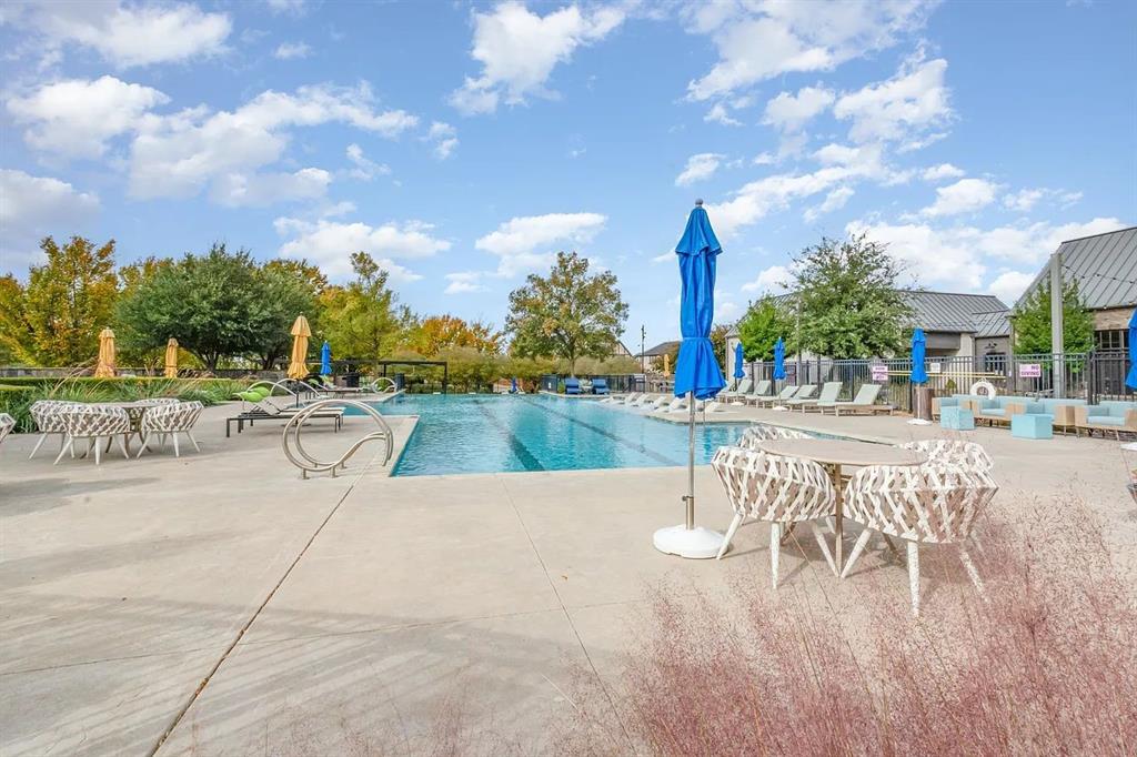 15866 Yellow Elder Road Frisco, TX 75035 - Photo 28 of 29 a view of a patio with swimming pool