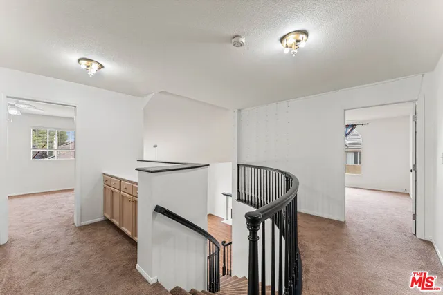 a view of livingroom with furniture and stairs