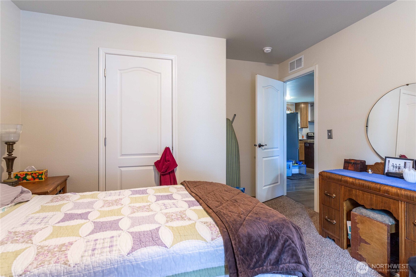 4550 Decatur Drive Ferndale, WA 98248 - Photo 19 of 22 a bedroom with a bed and a dresser