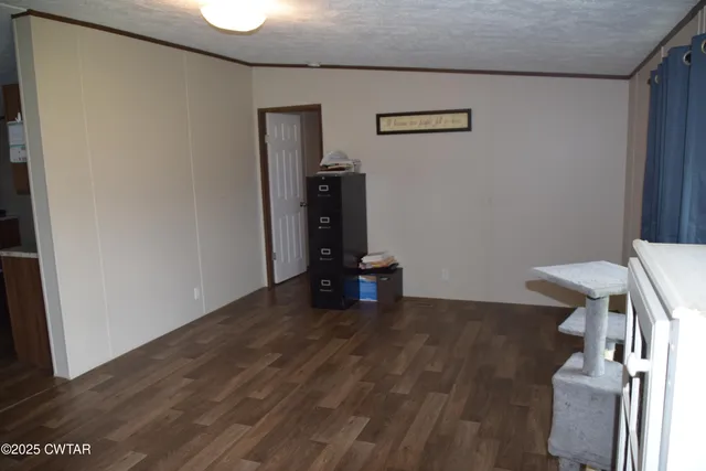 a view of workspace with wooden floor