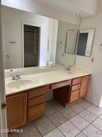 a bath tub sitting next to a shower