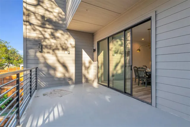 a view of walk in closet with clothes