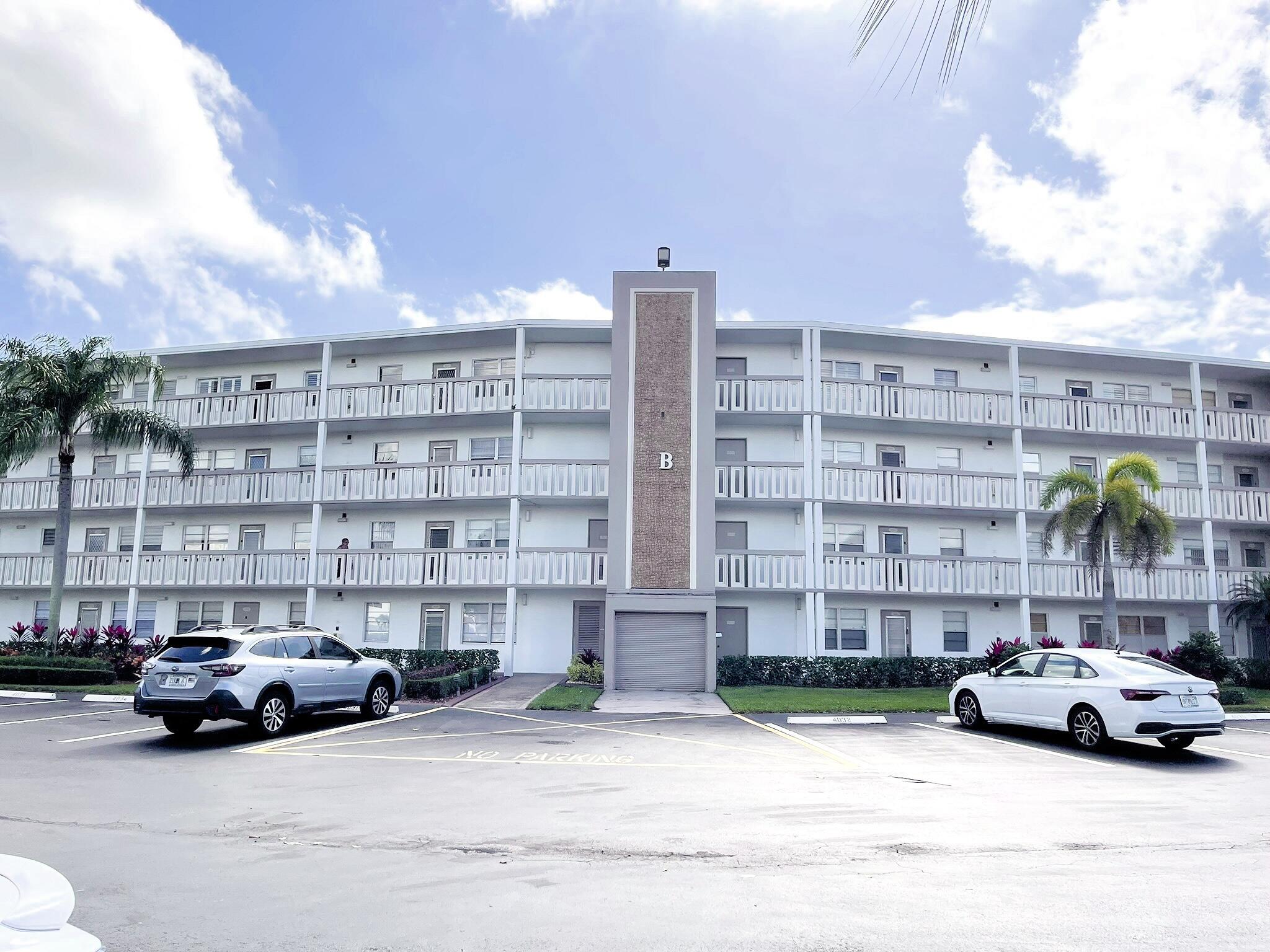 1030 Rexford B Boca Raton, FL 33434 - Photo 3 of 27 a car parked in front of a building