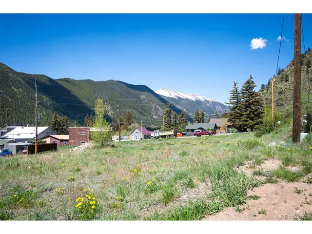 a view of swimming pool and outdoor seating
