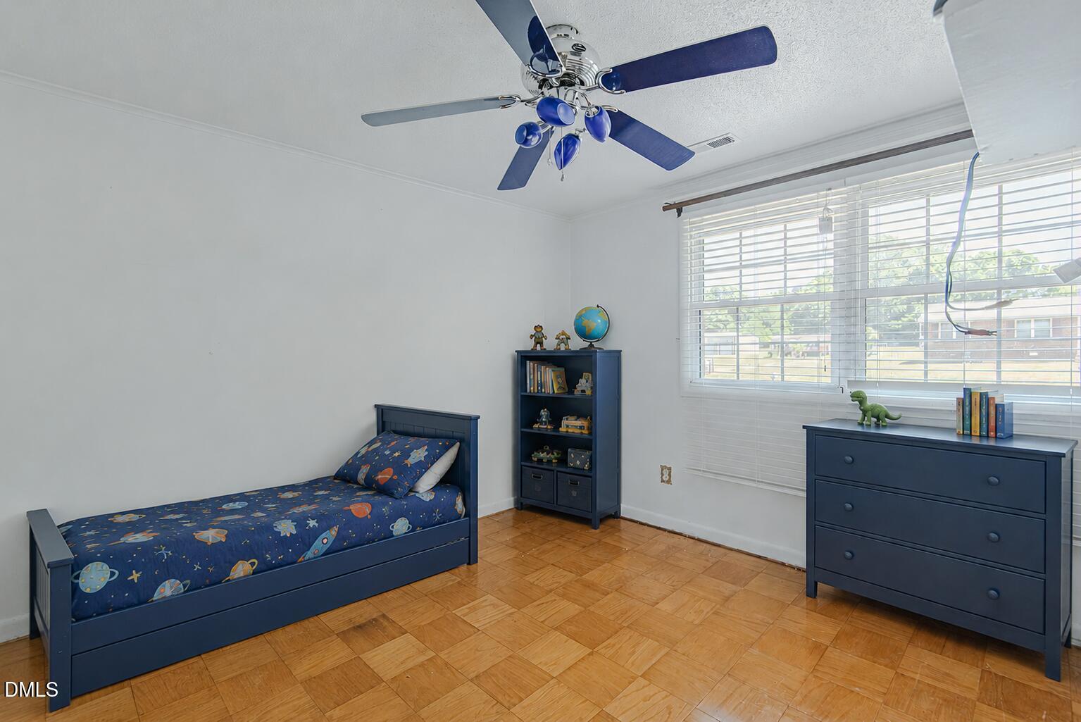 1302 Blacksmith Road Efland, NC 27243 - Photo 23 of 46 a bedroom with a bed and a window
