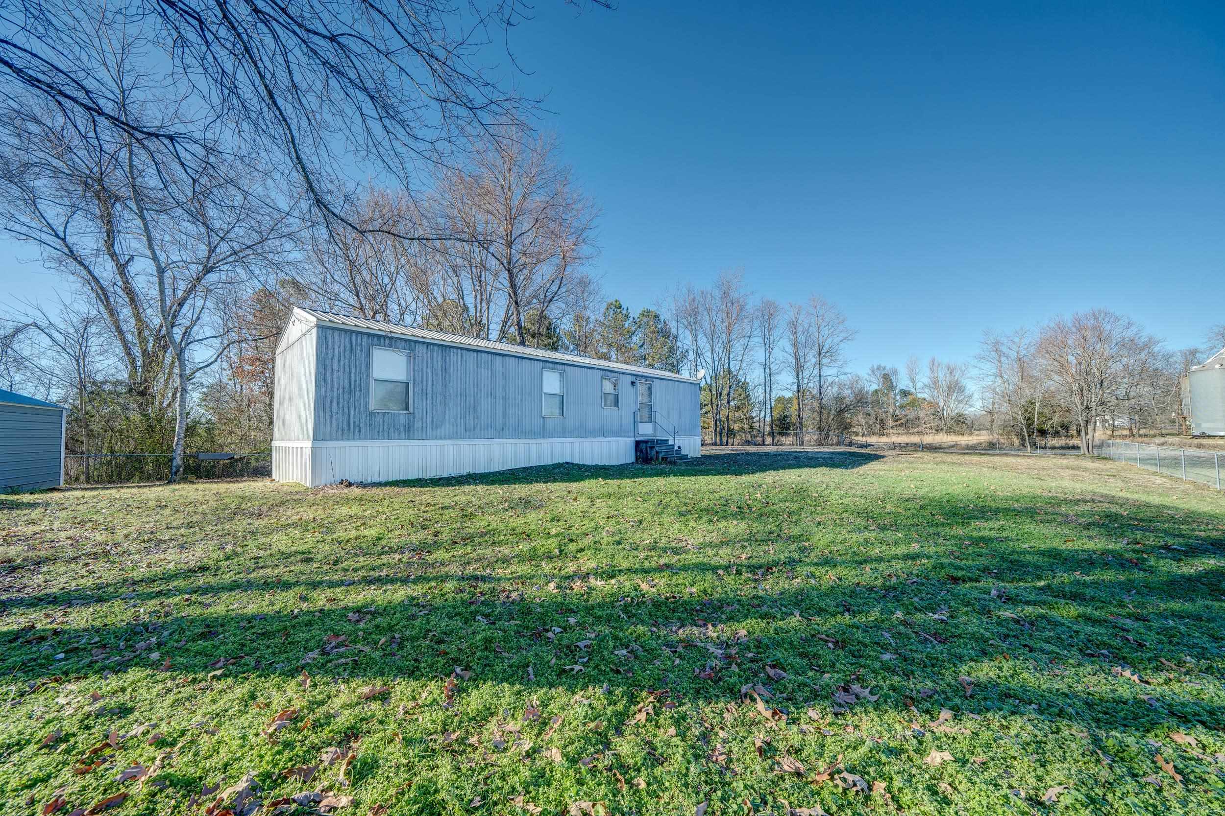 24315 Highway 76 Somerville, TN 38068 - Photo 15 of 27 a backyard of a house