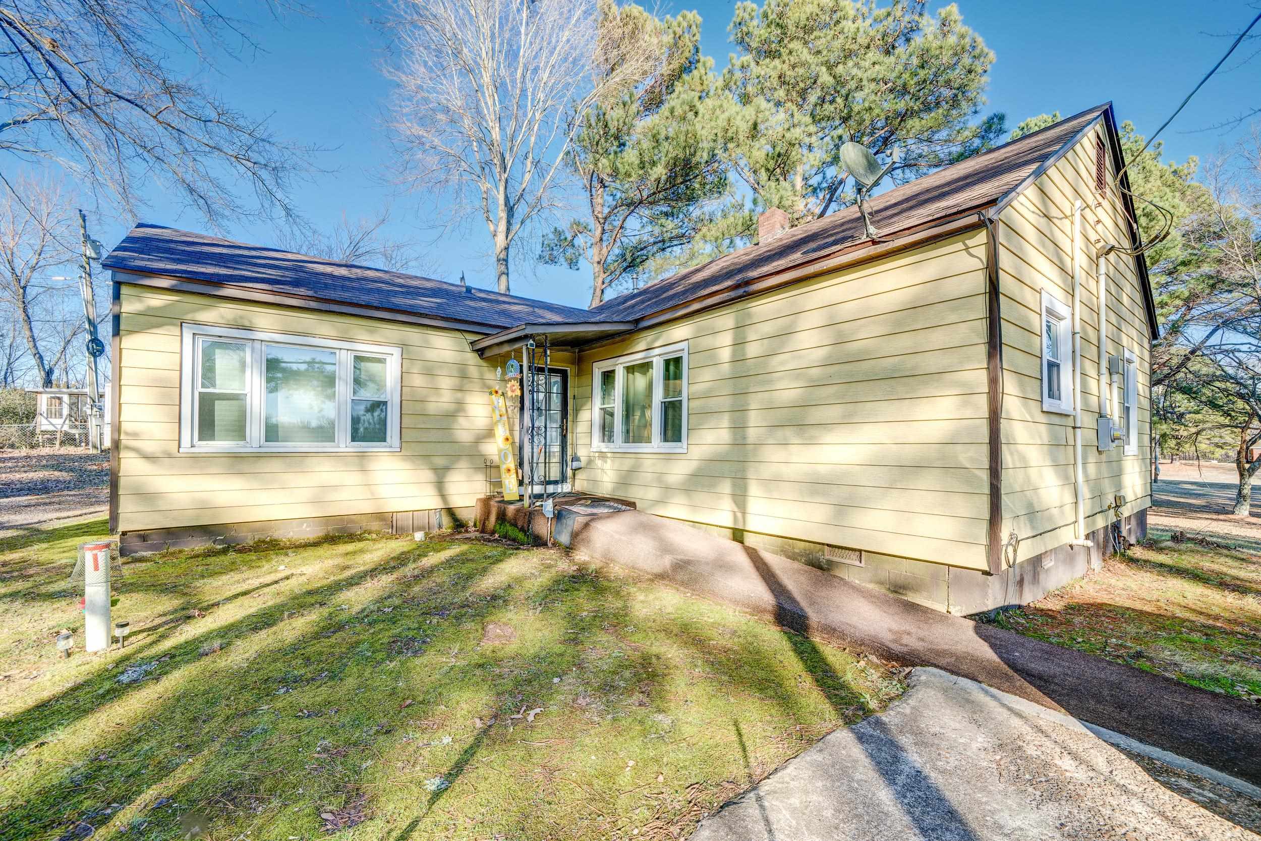24315 Highway 76 Somerville, TN 38068 - Photo 2 of 27 a view of a house with backyard and sitting area