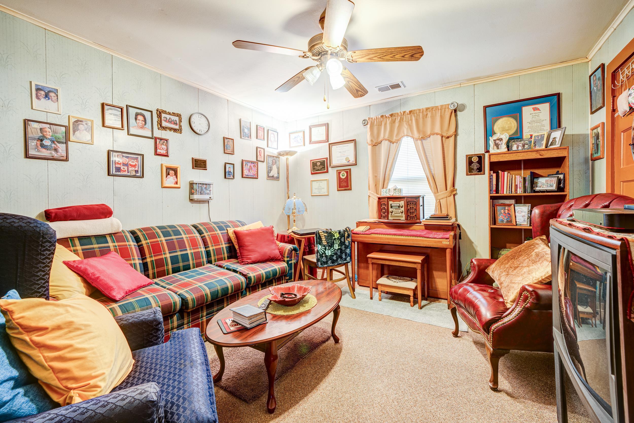 24315 Highway 76 Somerville, TN 38068 - Photo 10 of 27 a living room with furniture a flat screen tv and a window