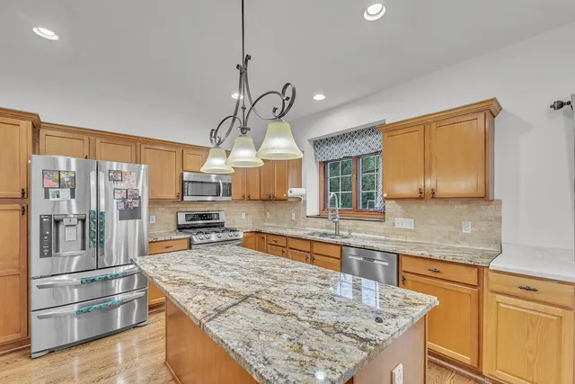 $535,000 | 215 Emerald Drive, Mount Pleasant, WI 53406