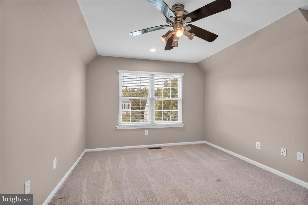 68 Hillside Lane Mount Laurel, NJ 08054 - Photo 19 of 36 an empty room with a window and a fan