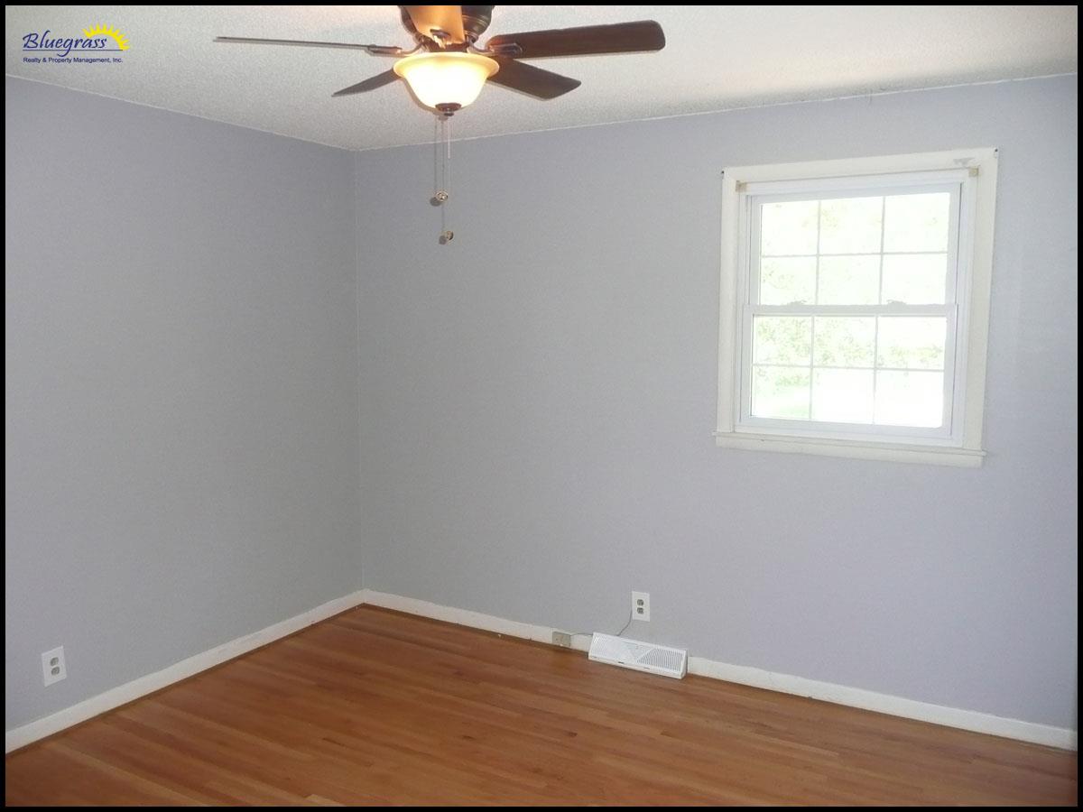 464 Rural Hill Road Nashville, TN 37217 - Photo 12 of 15 an empty room with wooden floor and windows
