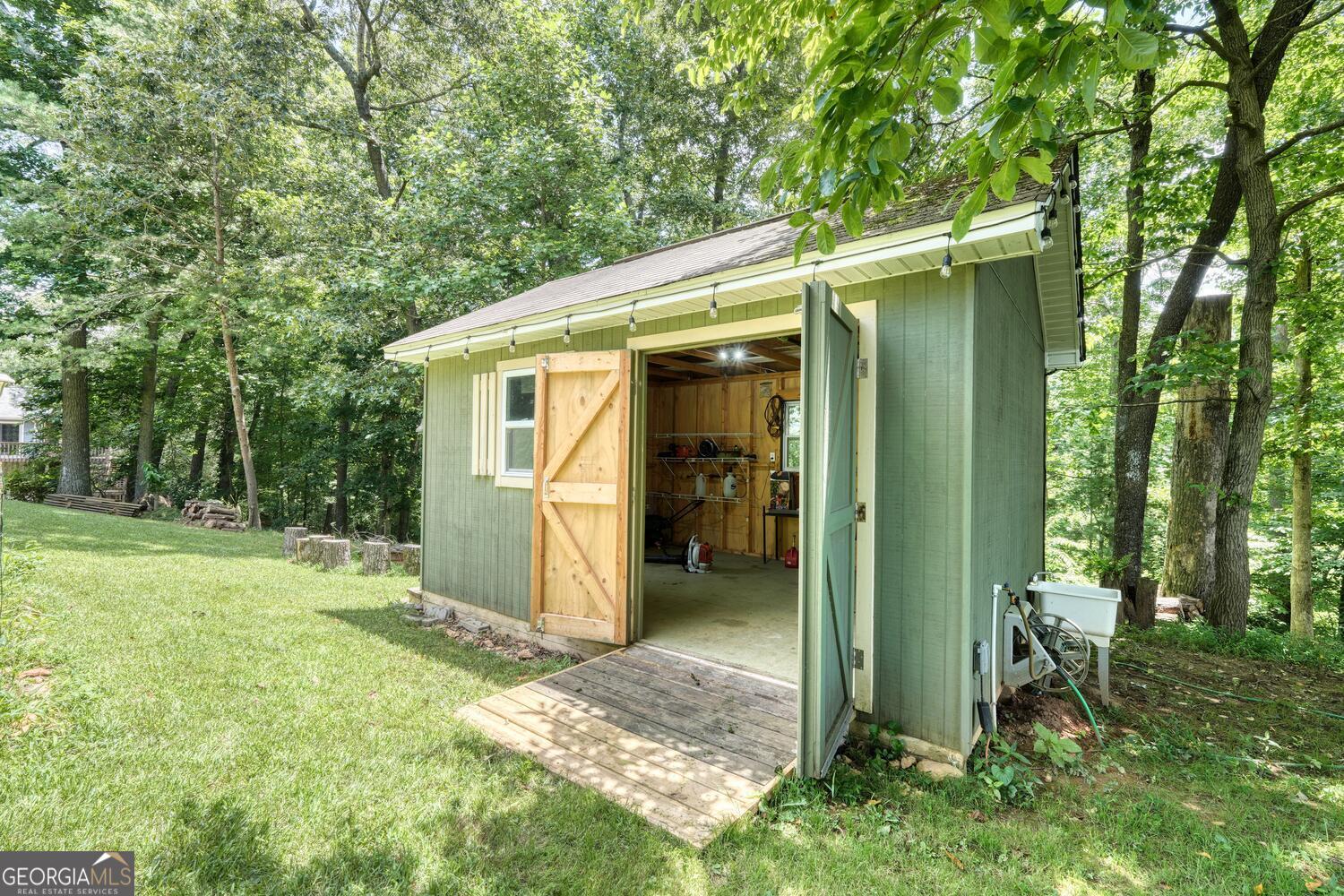 273 Coosa Valley Road Blairsville, GA 30512 - Photo 20 of 34 a view of a back yard of the house