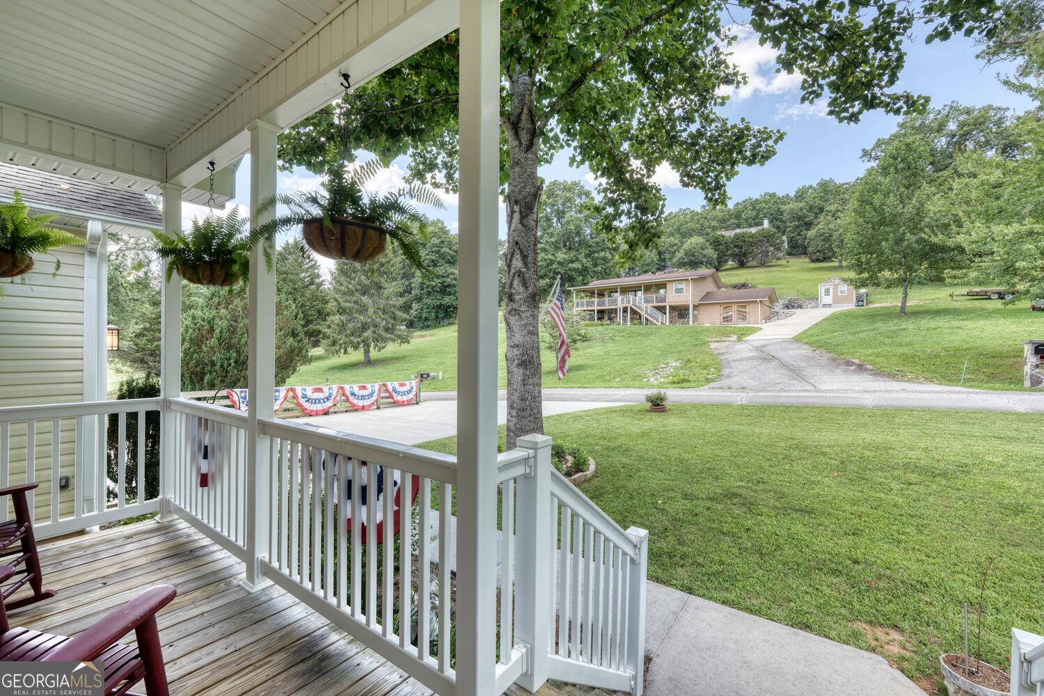 273 Coosa Valley Road Blairsville, GA 30512 - Photo 3 of 34 a view of a porch with a big yard