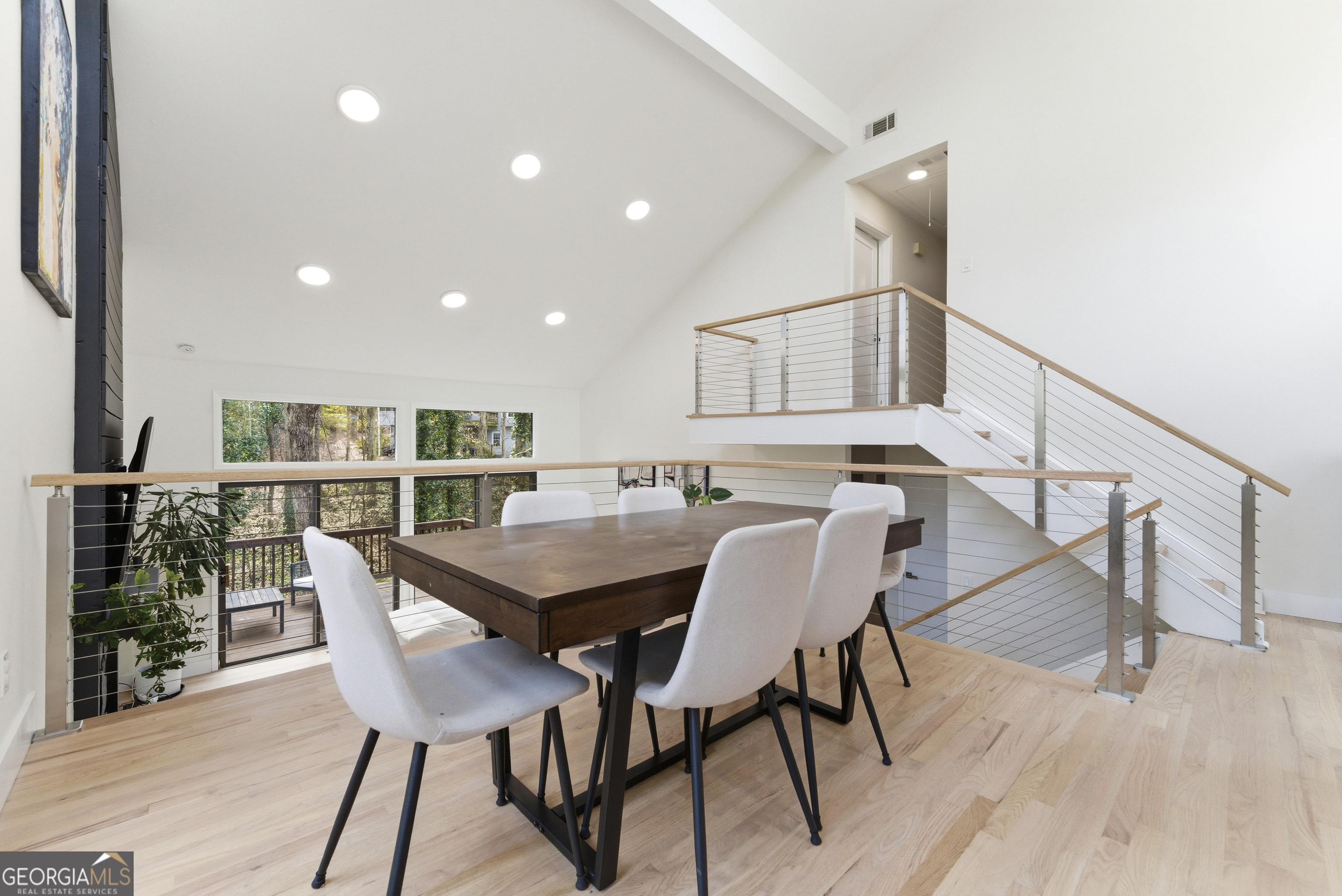 2704 Long Lake Drive Northeast Roswell, GA 30075 - Photo 8 of 48 a view of a dining room with furniture and wooden floor