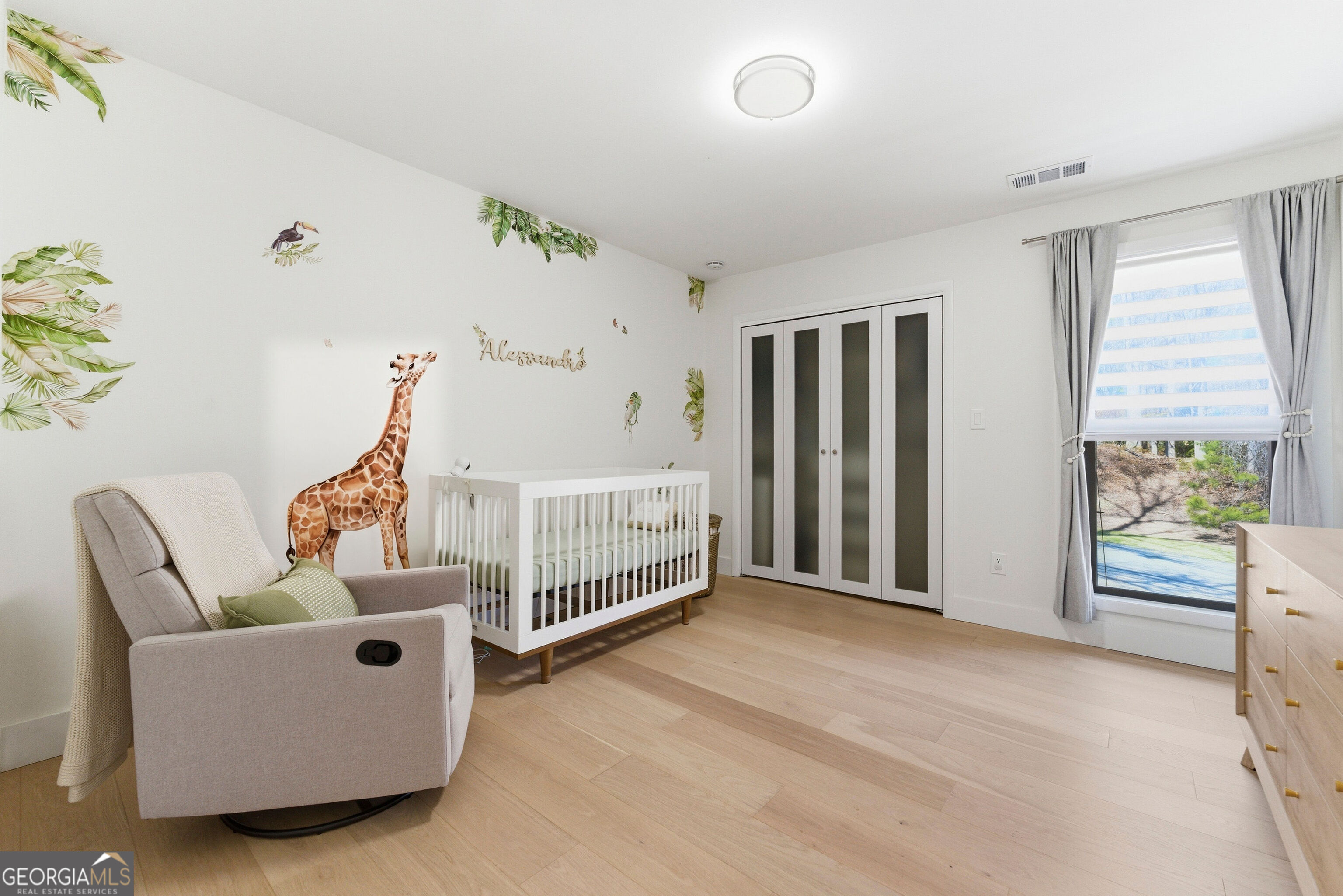 2704 Long Lake Drive Northeast Roswell, GA 30075 - Photo 9 of 48 a bed room with furniture and a window