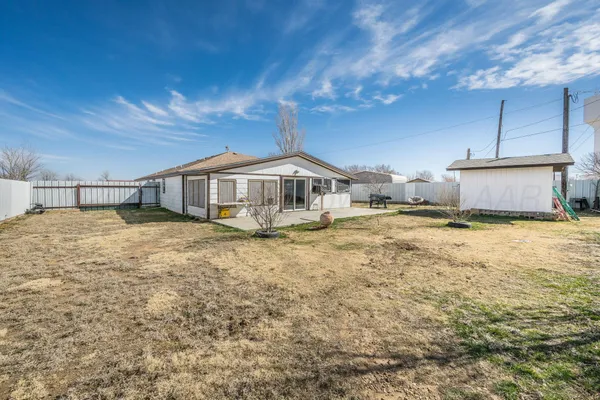 a house view with a garden space