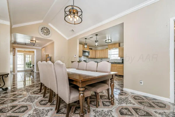 a view of a dining room with furniture