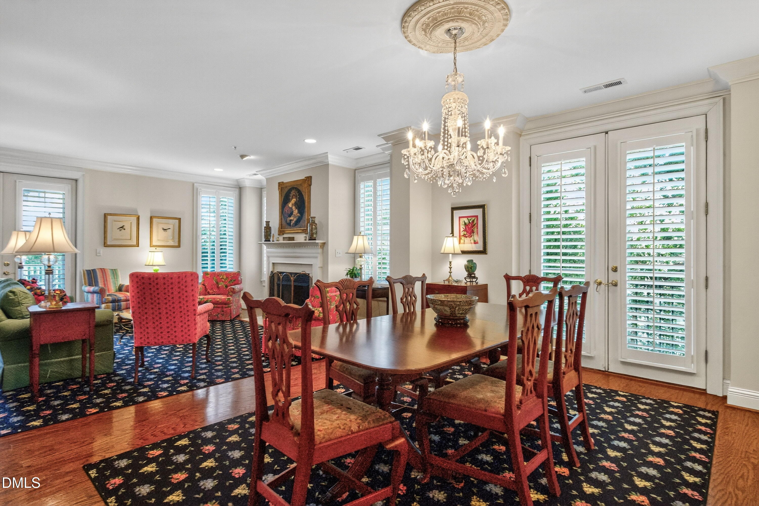2901 Market Bridge Lane, Unit 104 Raleigh, NC 27608 - Photo 15 of 45 a view of a dining room with furniture window and wooden floor
