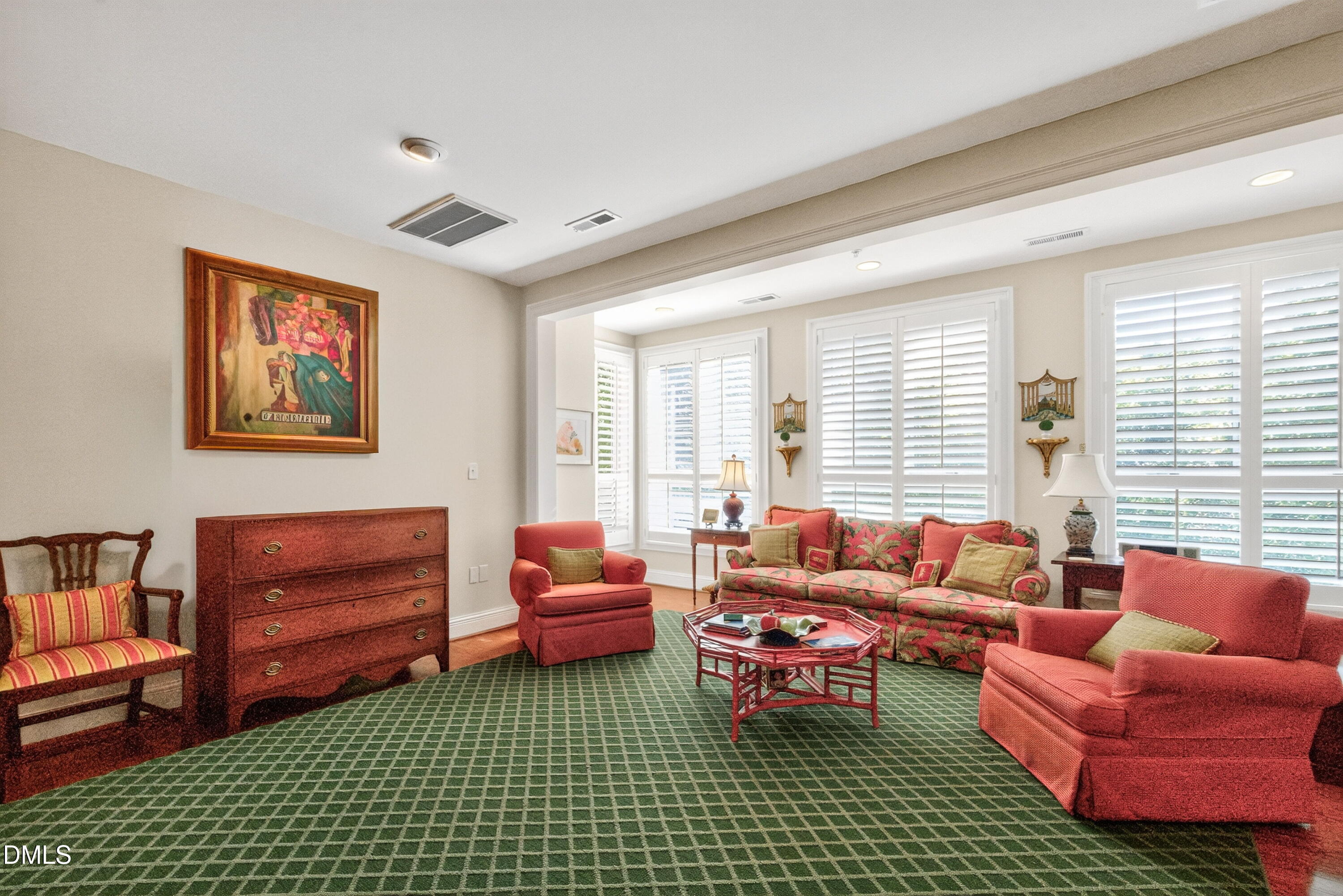 2901 Market Bridge Lane, Unit 104 Raleigh, NC 27608 - Photo 16 of 45 a living room with furniture a rug and a window