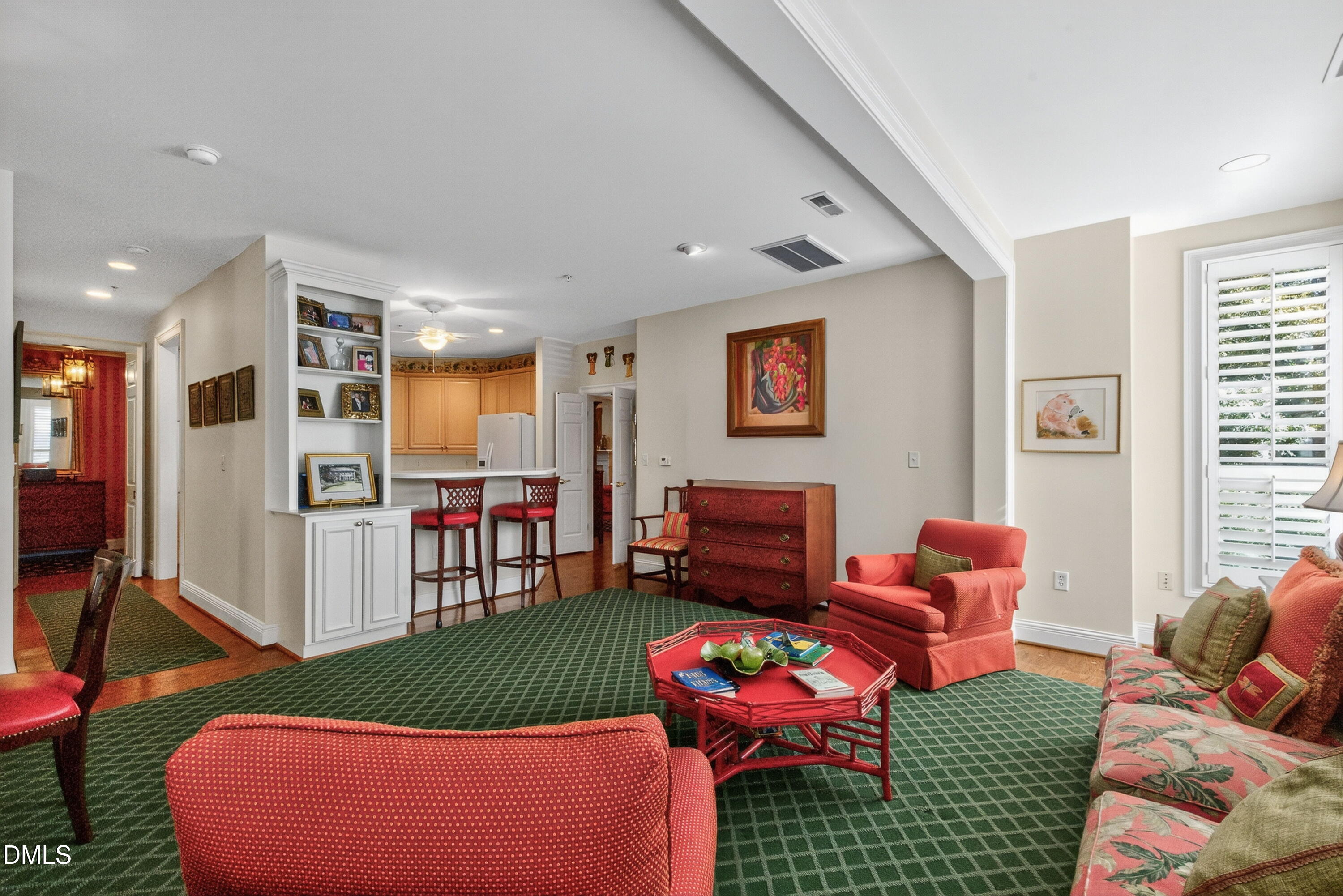 2901 Market Bridge Lane, Unit 104 Raleigh, NC 27608 - Photo 20 of 45 a living room with furniture a rug and a window