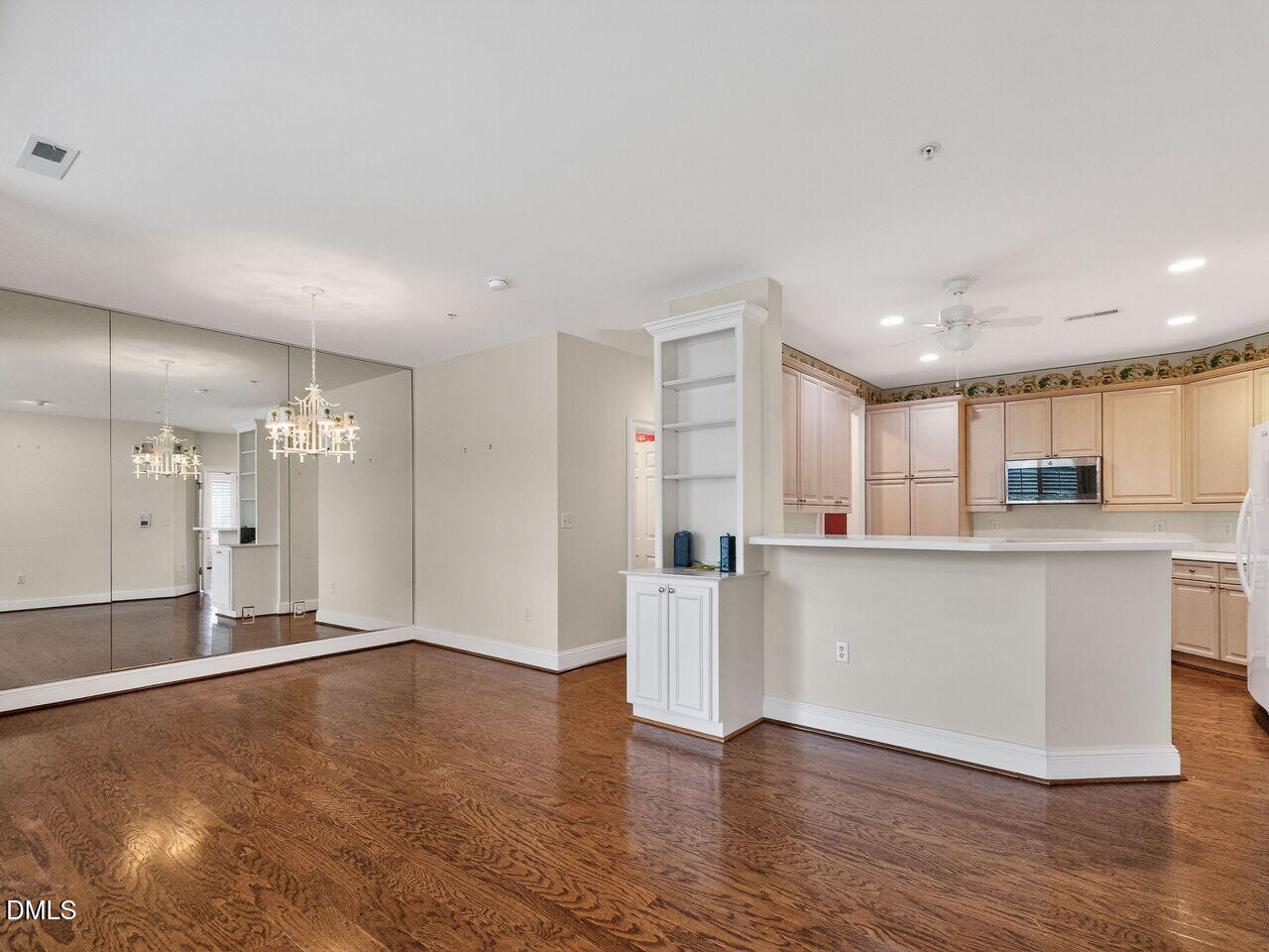 2901 Market Bridge Lane, Unit 104 Raleigh, NC 27608 - Photo 25 of 45 a view of a kitchen with wooden floor