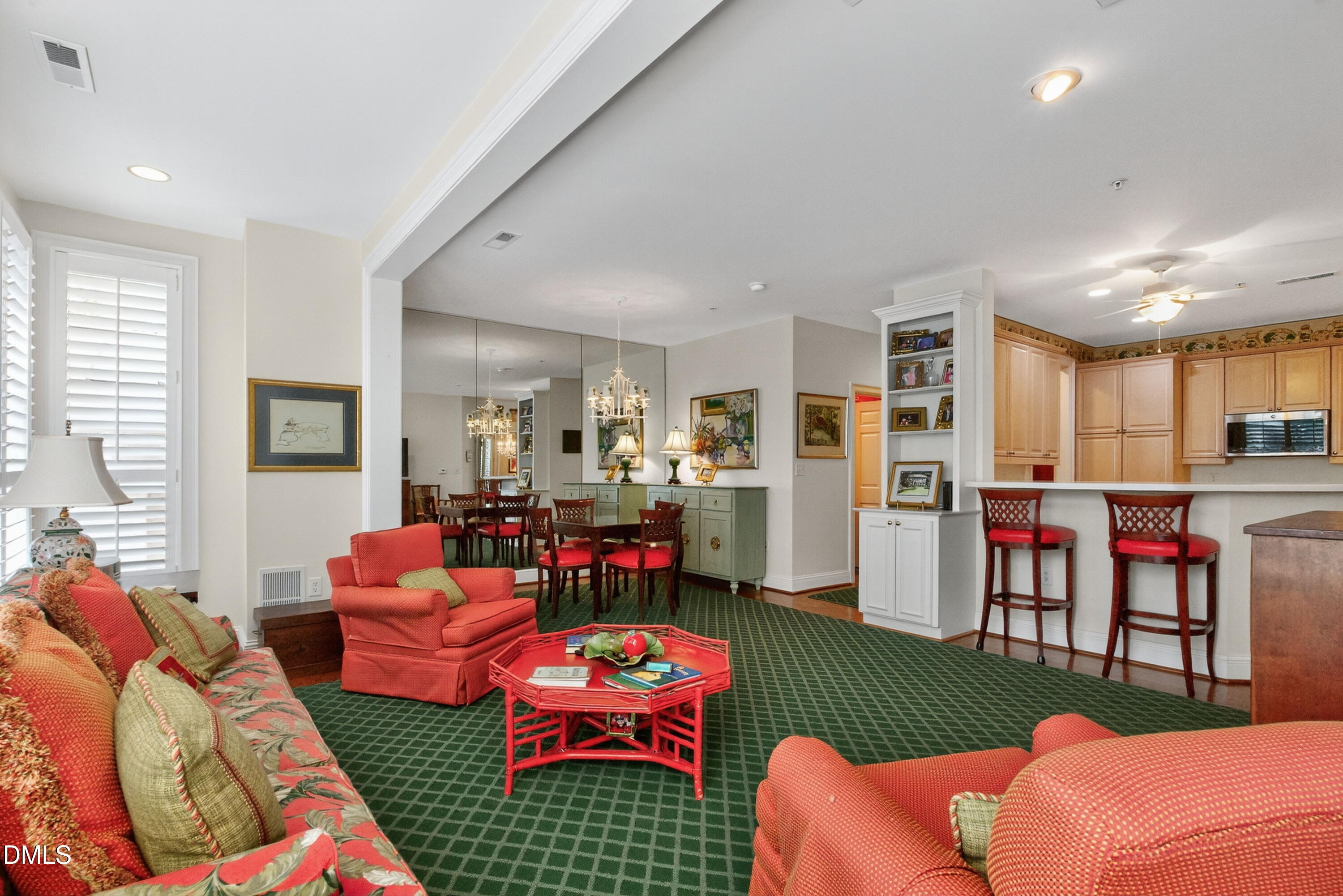 2901 Market Bridge Lane, Unit 104 Raleigh, NC 27608 - Photo 27 of 45 a living room with furniture a rug and a table