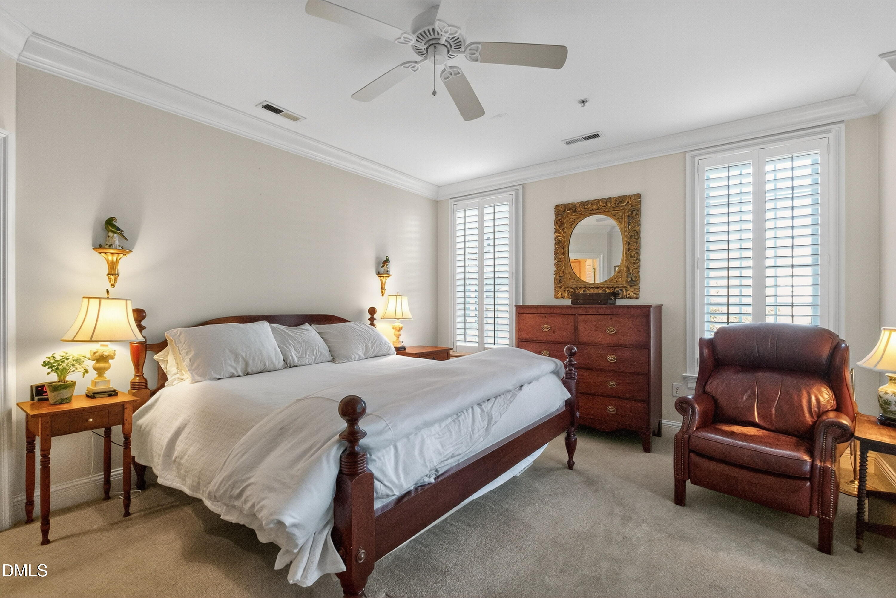 2901 Market Bridge Lane, Unit 104 Raleigh, NC 27608 - Photo 28 of 45 a bedroom with a bed and furniture