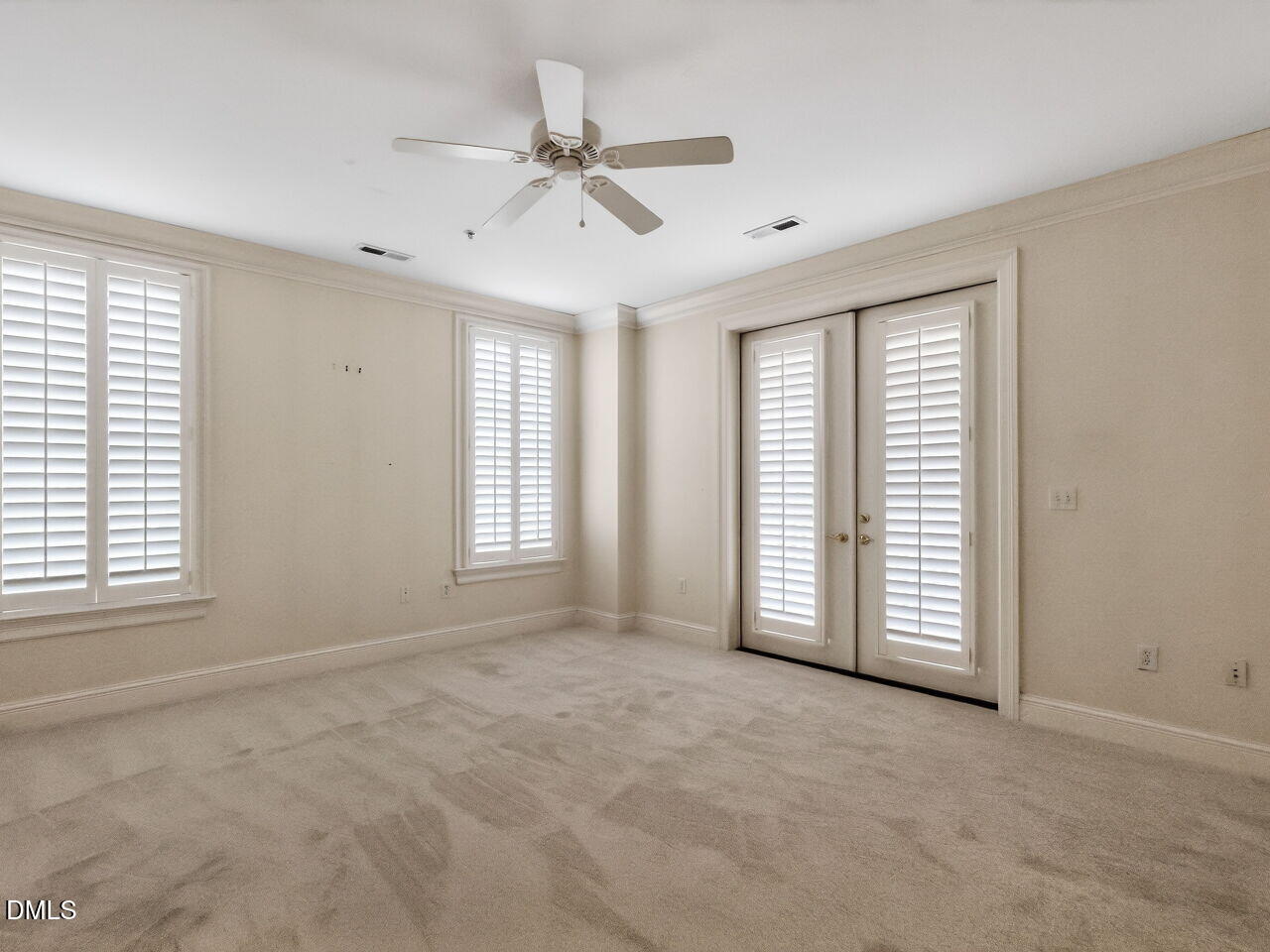 2901 Market Bridge Lane, Unit 104 Raleigh, NC 27608 - Photo 29 of 45 a view of an empty room with a window