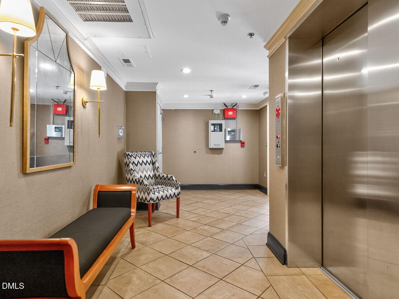 2901 Market Bridge Lane, Unit 104 Raleigh, NC 27608 - Photo 3 of 45 a lobby with furniture and table