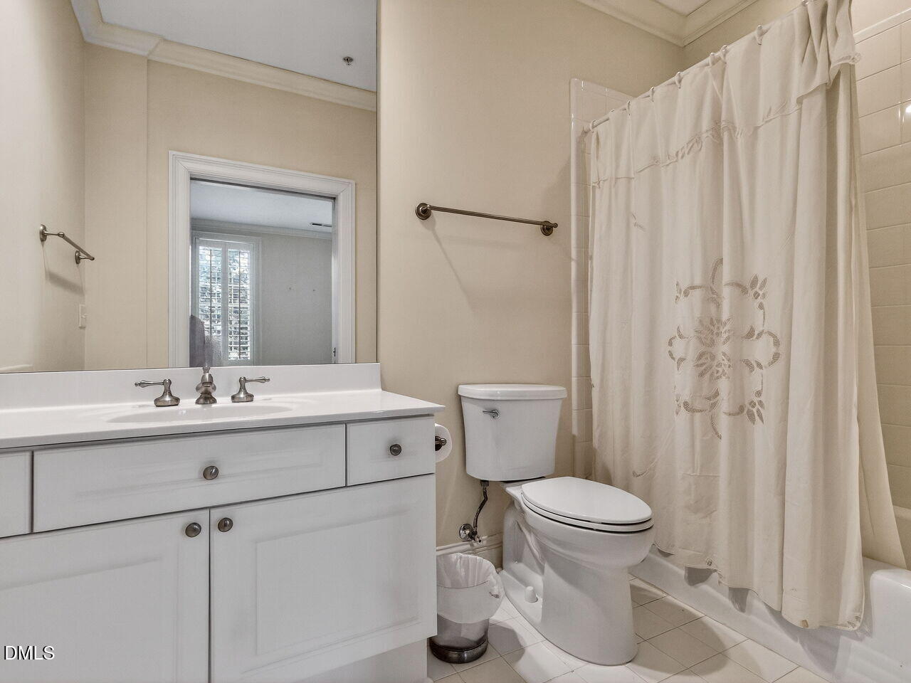 2901 Market Bridge Lane, Unit 104 Raleigh, NC 27608 - Photo 36 of 45 a bathroom with a sink toilet and shower