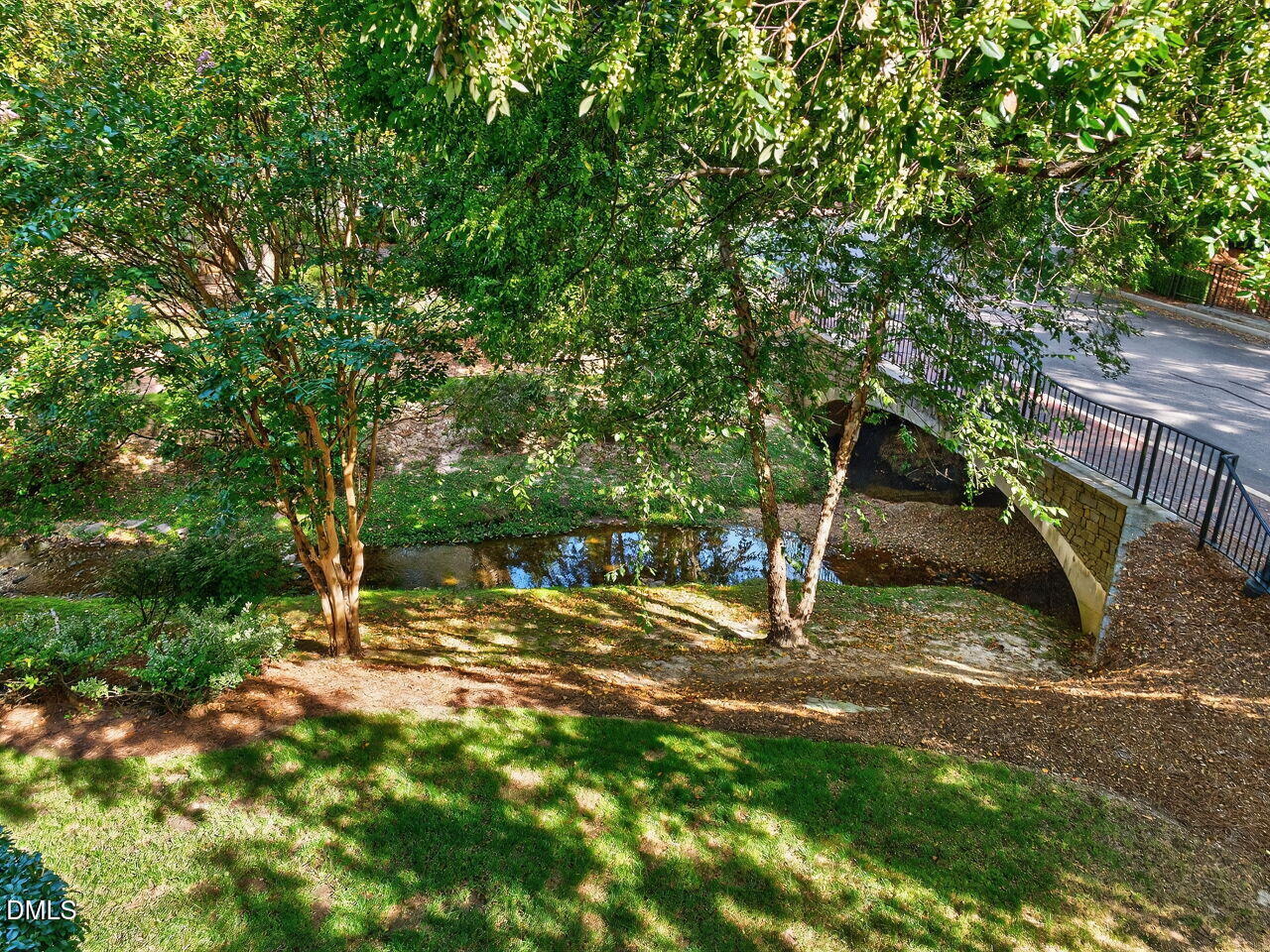 2901 Market Bridge Lane, Unit 104 Raleigh, NC 27608 - Photo 40 of 45 a view of outdoor space with deck and tree