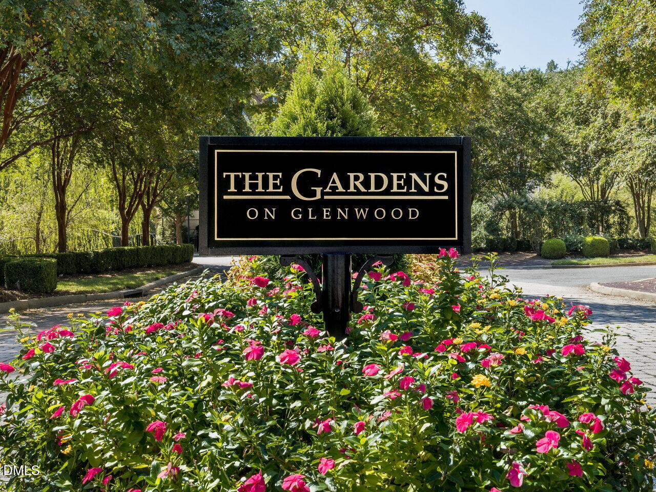 2901 Market Bridge Lane, Unit 104 Raleigh, NC 27608 - Photo 41 of 45 a sign on the side of the road