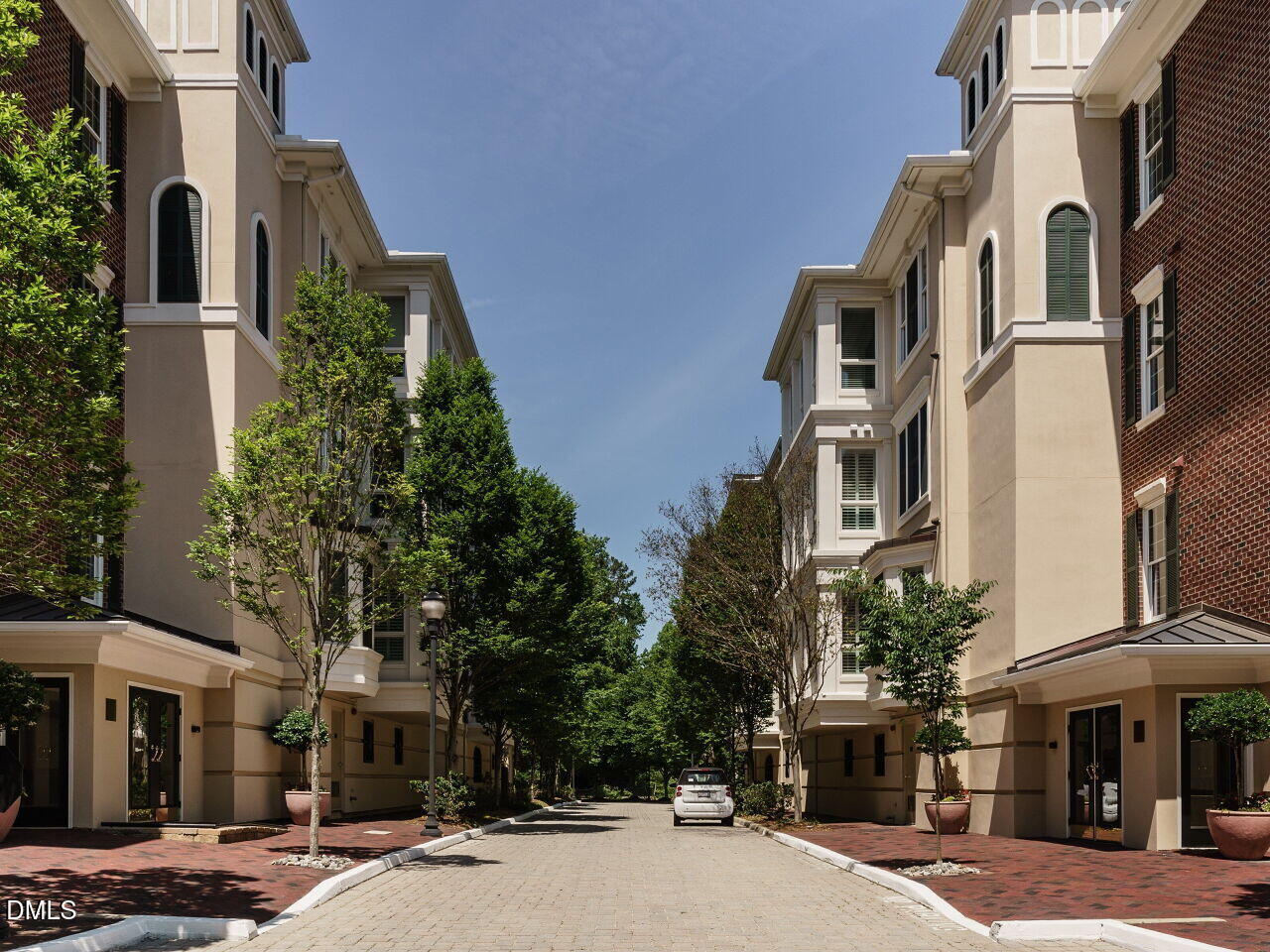 2901 Market Bridge Lane, Unit 104 Raleigh, NC 27608 - Photo 42 of 45 a front view of a building with street view