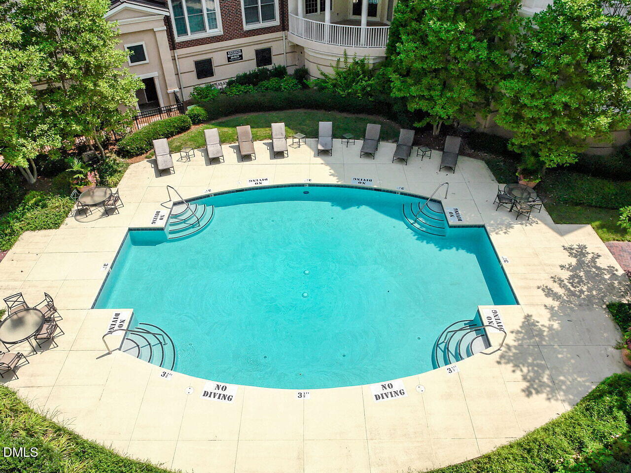 2901 Market Bridge Lane, Unit 104 Raleigh, NC 27608 - Photo 43 of 45 a view of a swimming pool with a patio