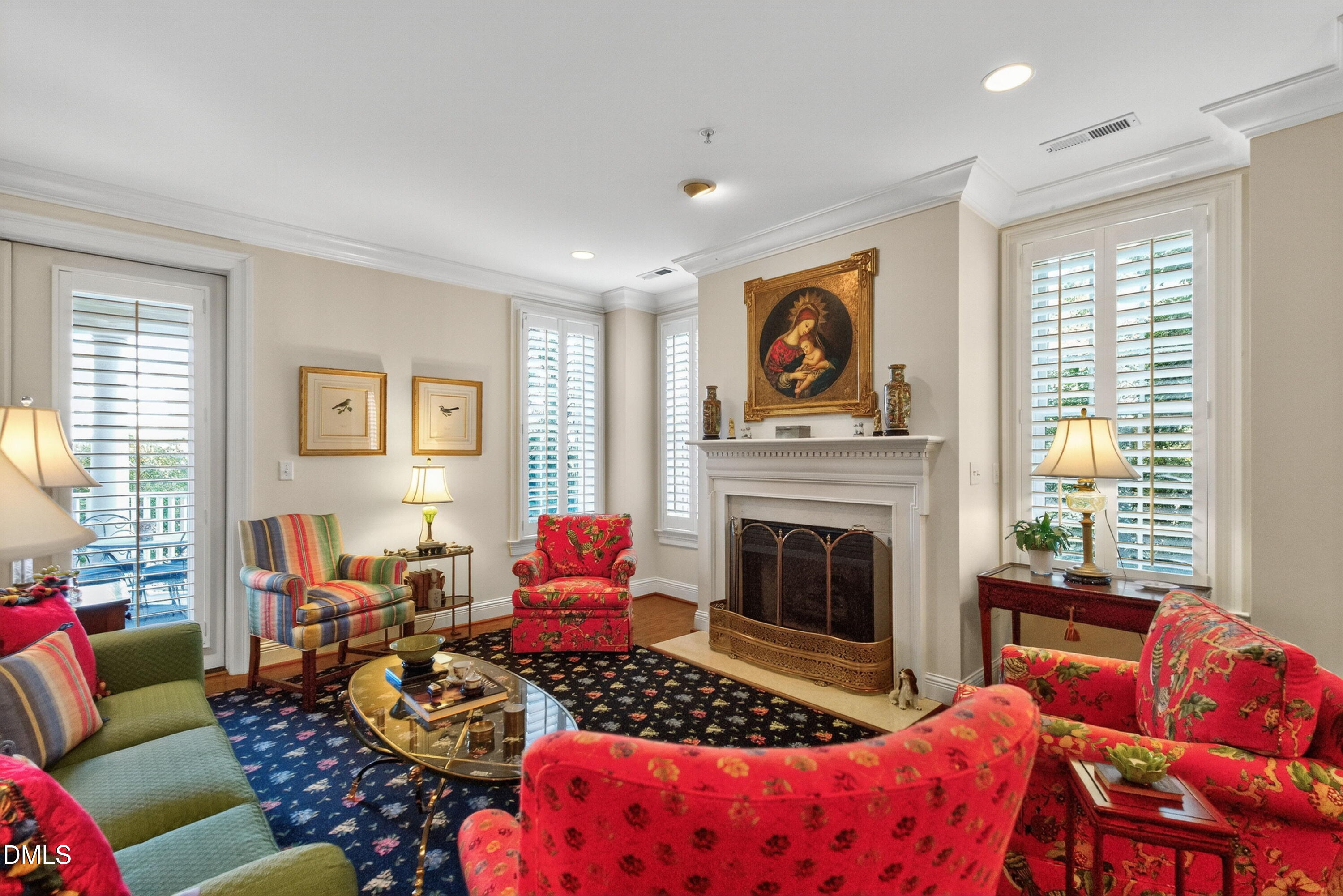 2901 Market Bridge Lane, Unit 104 Raleigh, NC 27608 - Photo 8 of 45 a living room with furniture fireplace and window