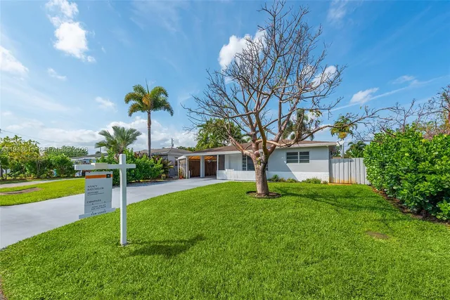 a house view with a garden space