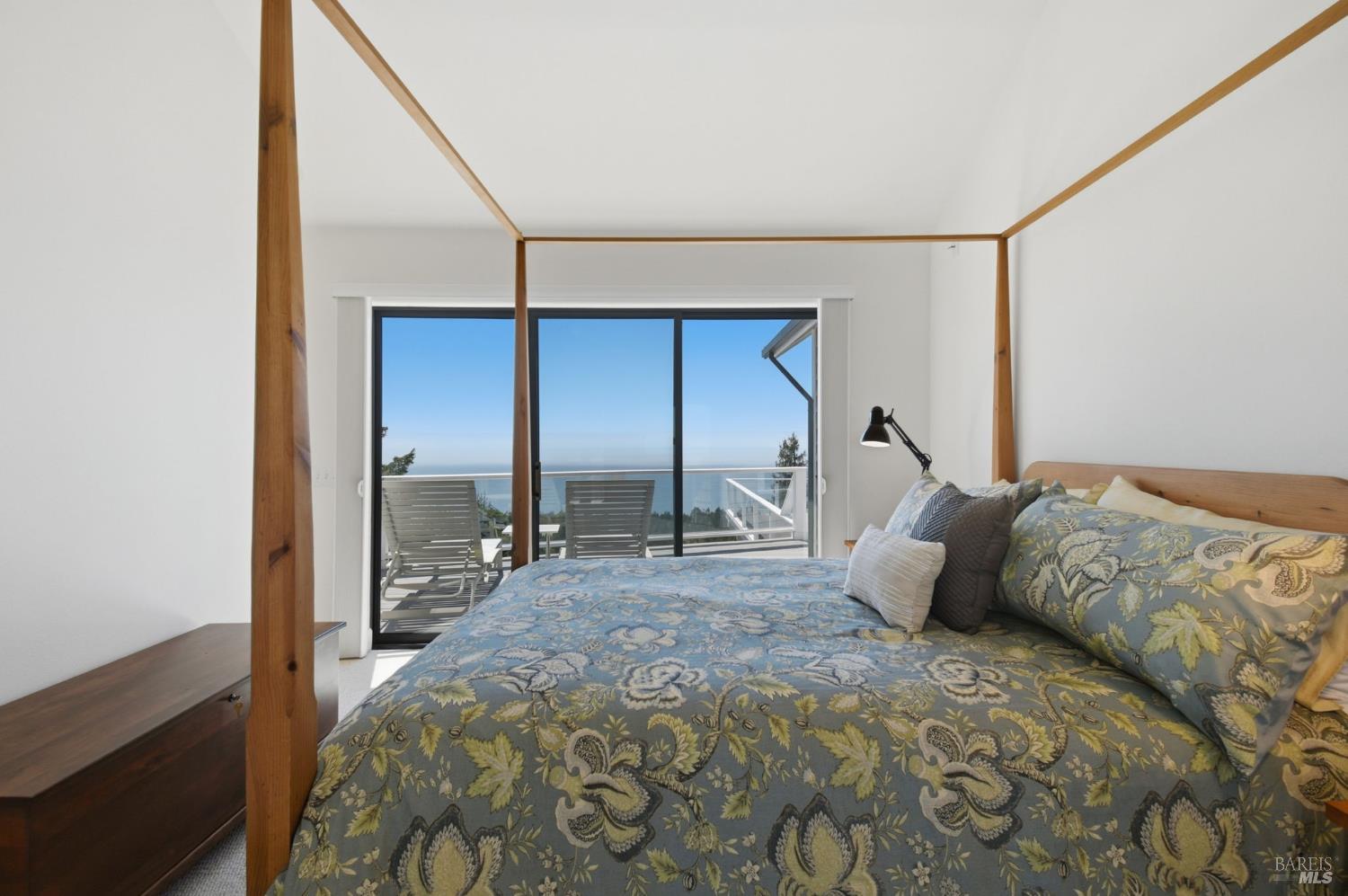 45340 Sequoia Road Gualala, CA 95445 - Photo 15 of 63 Primary bedroom opening up to view deck.