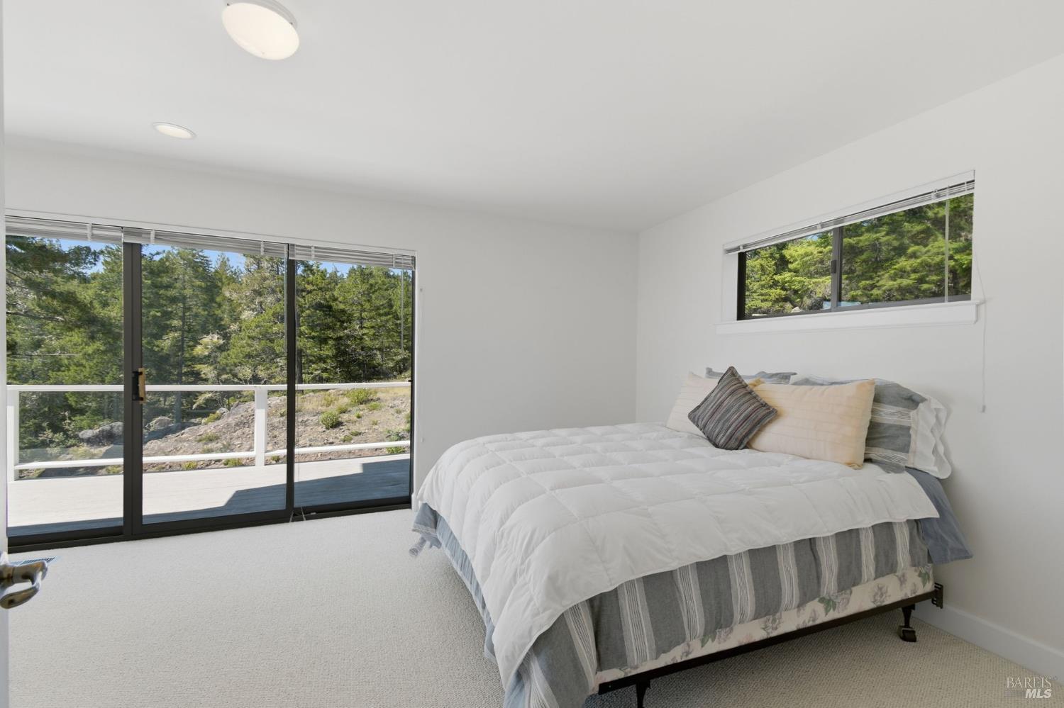 45340 Sequoia Road Gualala, CA 95445 - Photo 21 of 63 Private secondary bedroom with its own private deck.