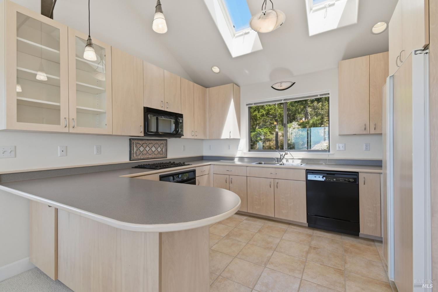 45340 Sequoia Road Gualala, CA 95445 - Photo 9 of 63 Immaculate kitchen area open to dining, living and view deck.