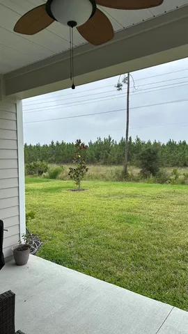 a bathroom with a sink mirror vanity and toilet