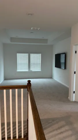 a view of a room and window