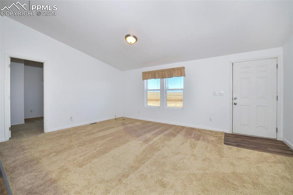 33355 Berndt Road Yoder, CO 80864 - Photo 13 of 26 an empty room with a window