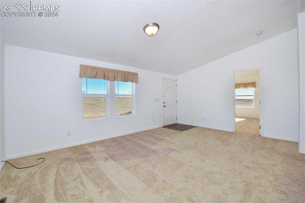 33355 Berndt Road Yoder, CO 80864 - Photo 14 of 26 a view of an empty room with a window