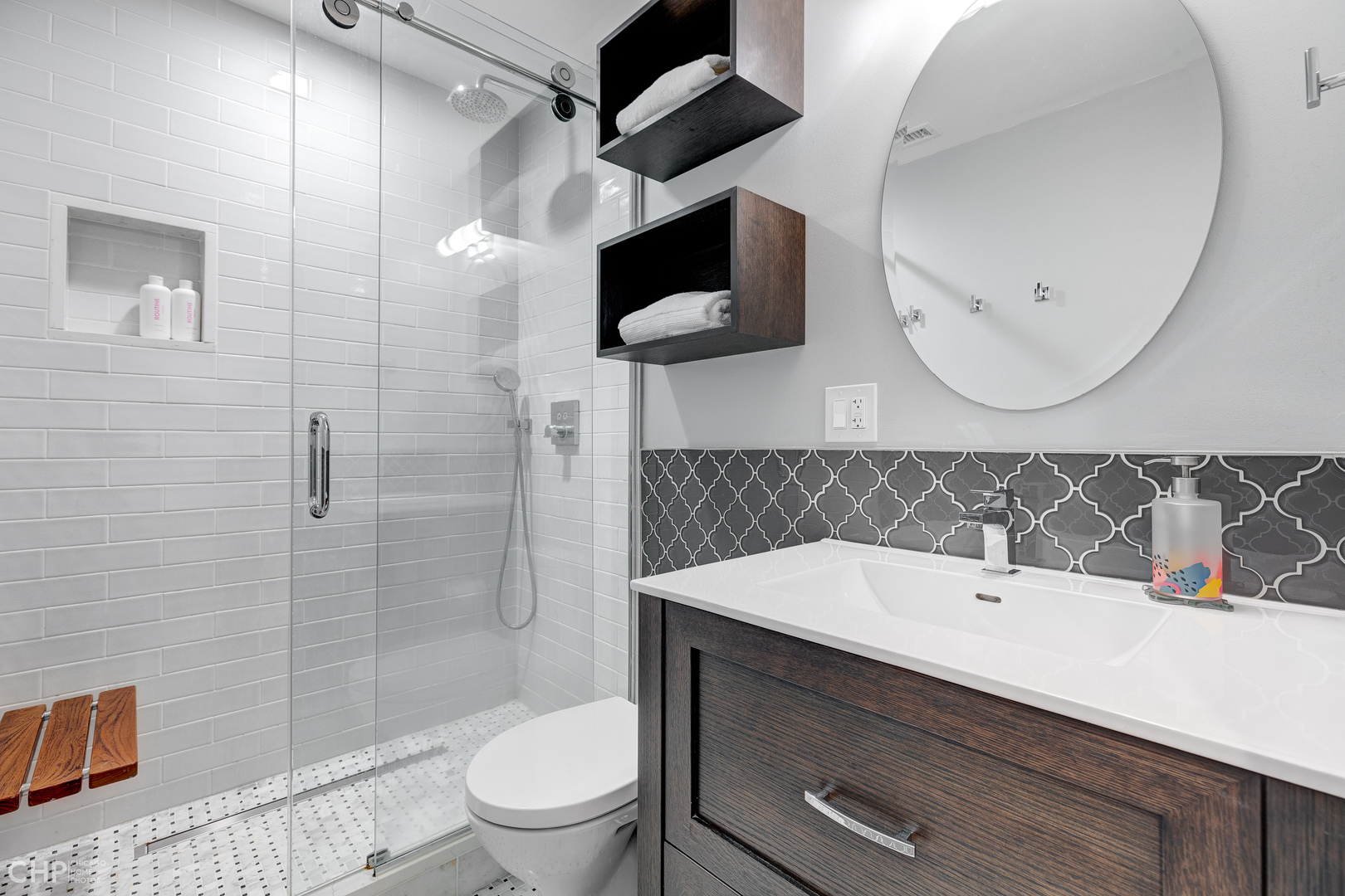 275 Lawton Road Riverside, IL 60546 - Photo 21 of 35 a bathroom with a sink a toilet and a mirror