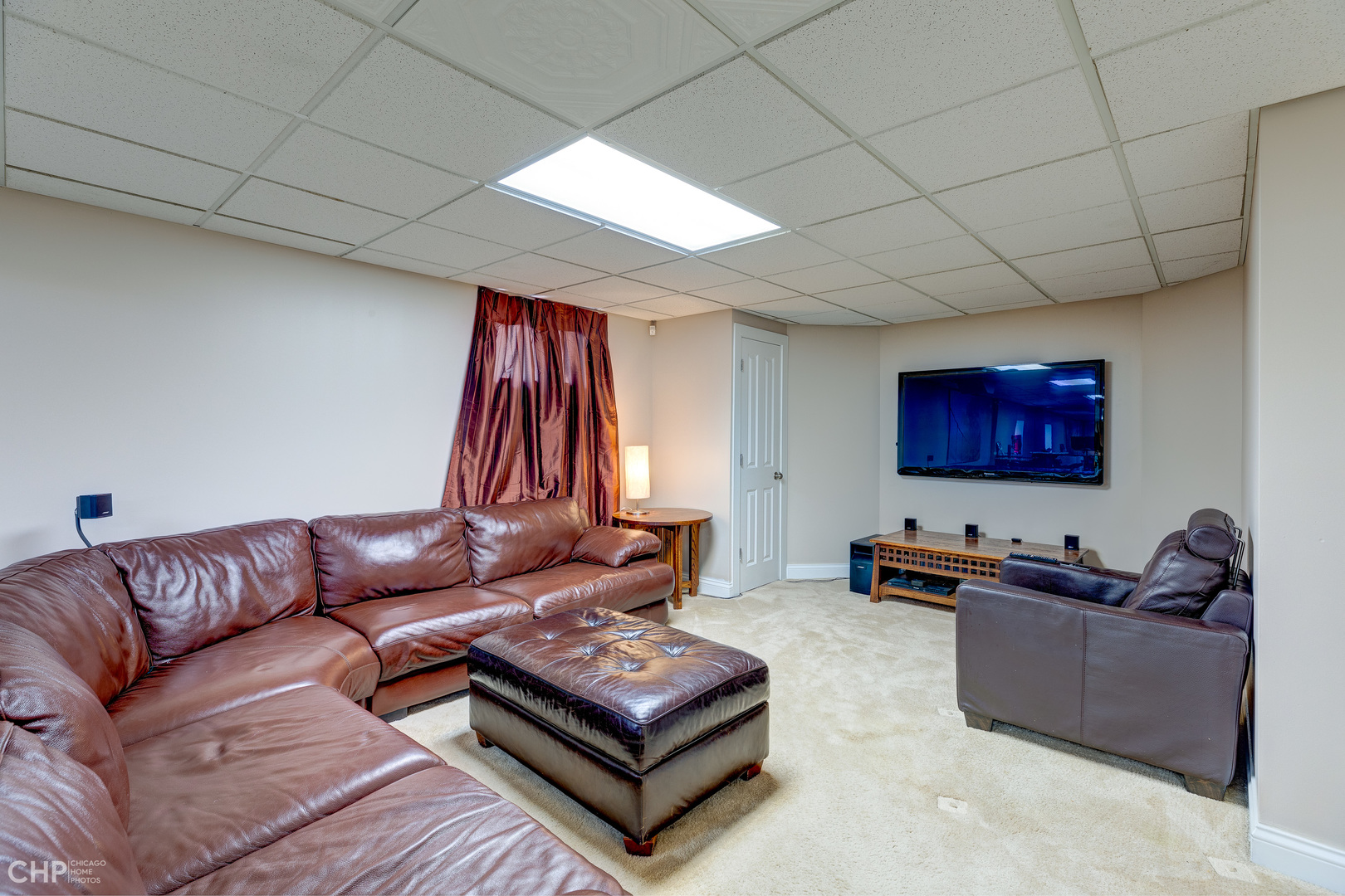 275 Lawton Road Riverside, IL 60546 - Photo 25 of 35 a living room with furniture a rug and a window