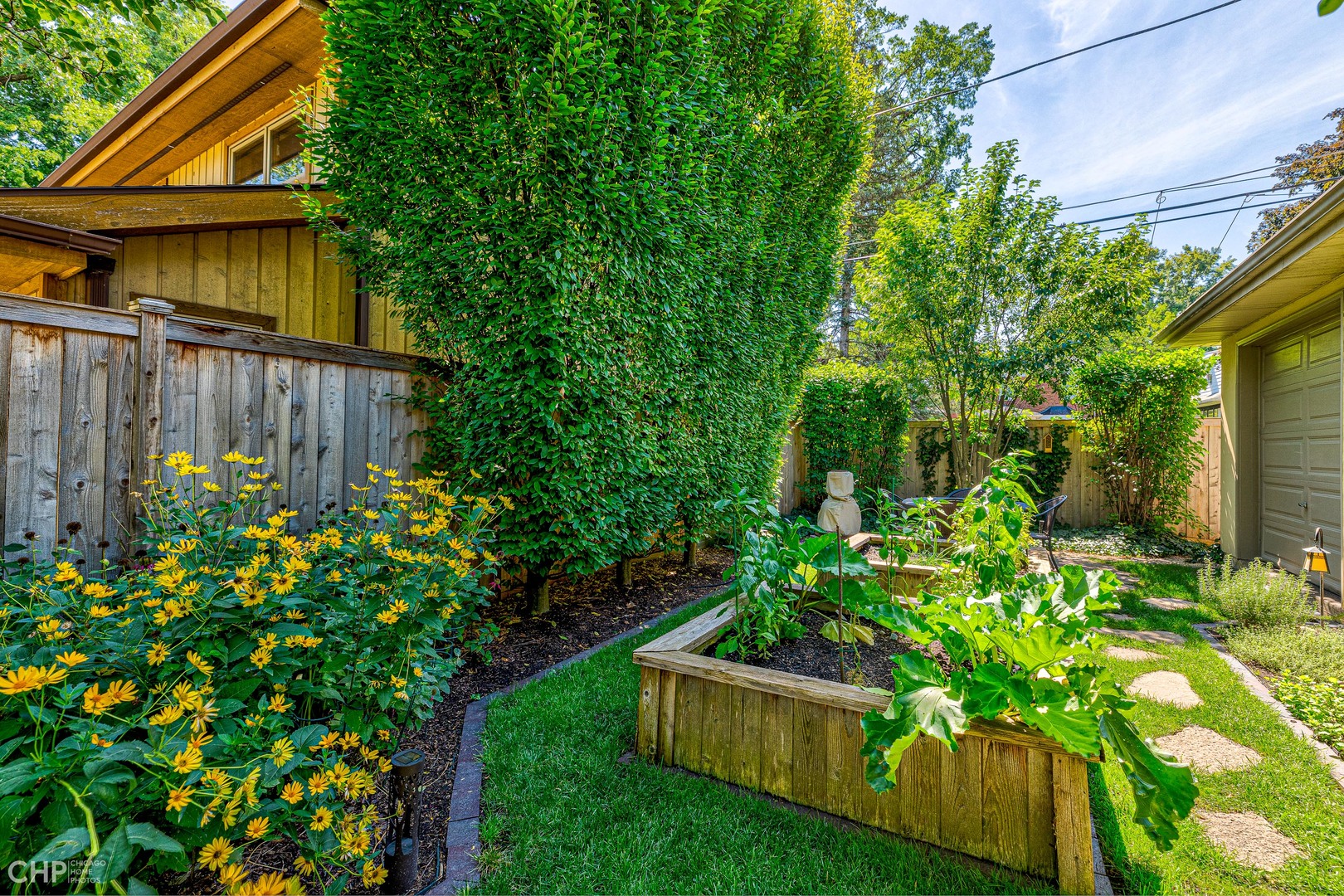 275 Lawton Road Riverside, IL 60546 - Photo 32 of 35 a view of a backyard with plants