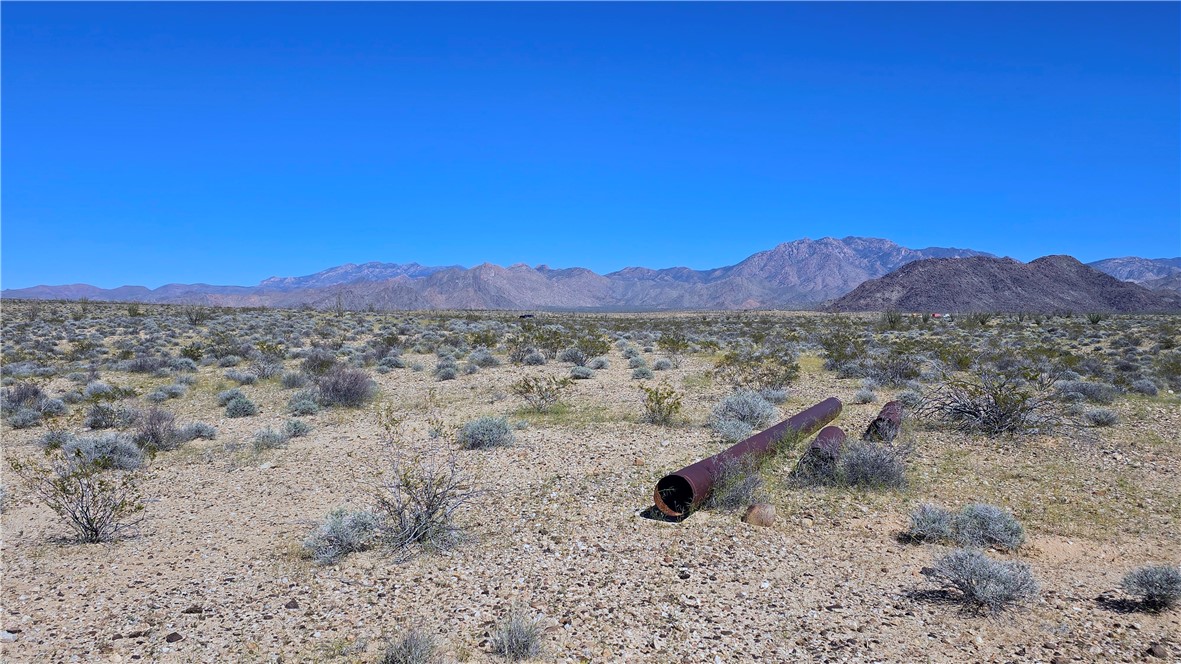 208-21-166 South Akchin Road Yucca, AZ 86438 - Photo 4 of 16 a view of a mountain with a mountain in the background